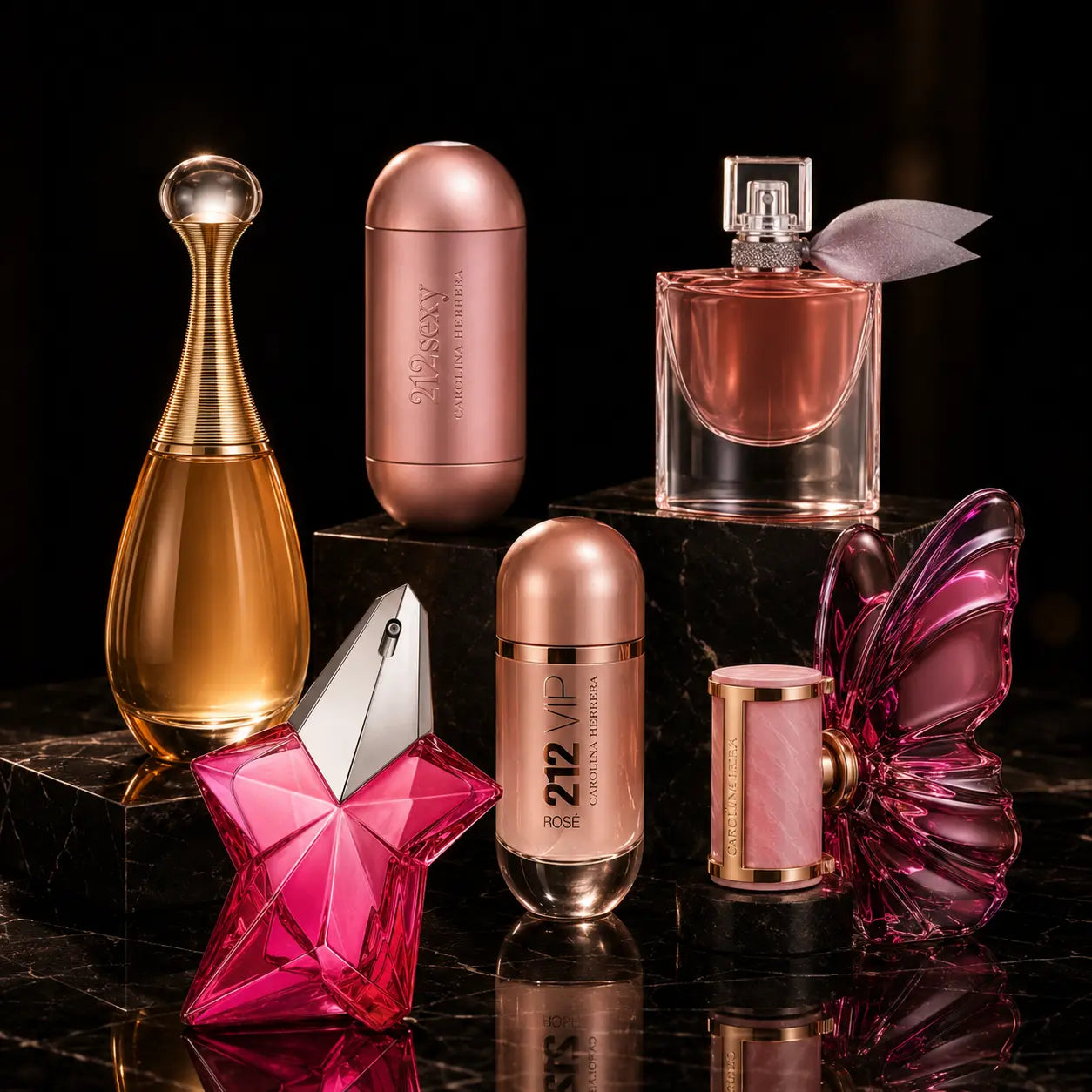 Colección de perfumes femeninos de lujo sobre mármol negro, con frascos en tonos dorados, rosados y fucsias, iluminación elegante y estilo premium para ESSENTIA.