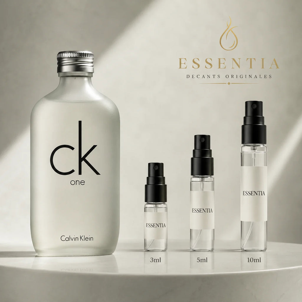 CK One Calvin Klein en decant original ESSENTIA, perfume original junto a frascos de decant en presentaciones de 3ml, 5ml y 10ml.